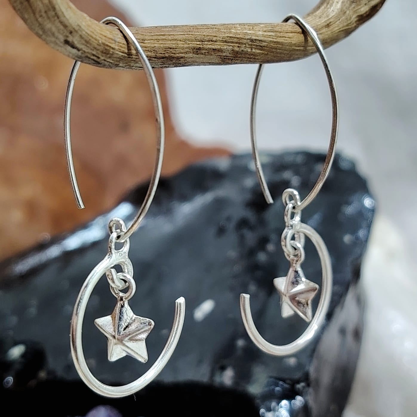 Aros largos con figura estrella