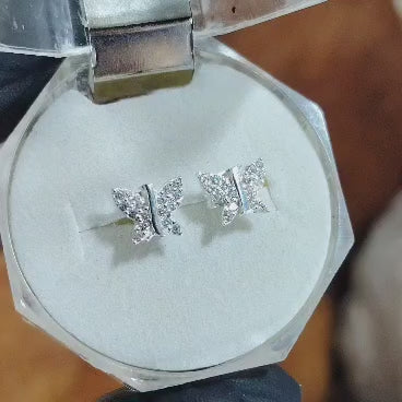 Aros pegados Mariposa con incrustaciones traslúcidas.