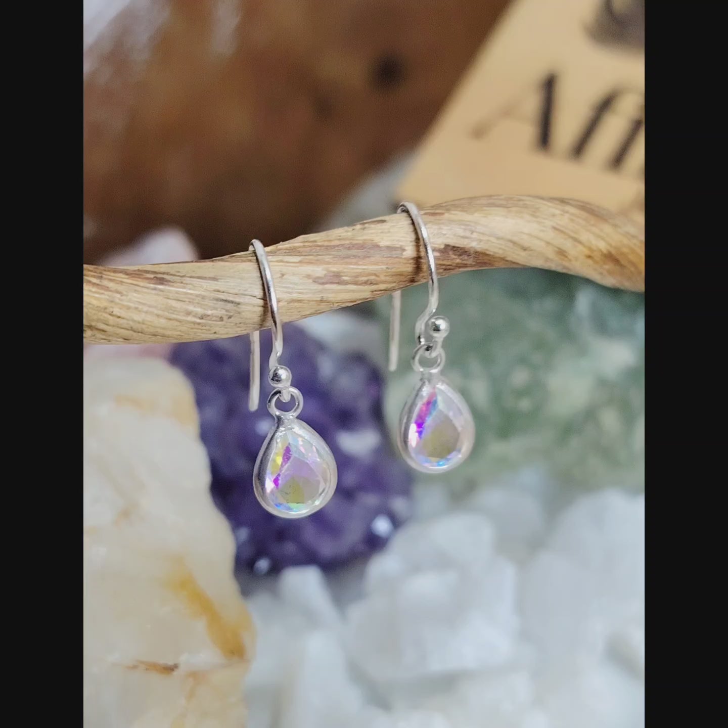 Aros semi largos de plata lagrima crista tornasol