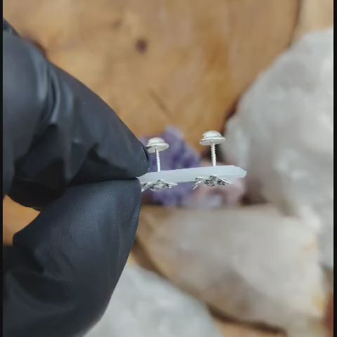 Aros atornillados mariposa con cristales morado claro