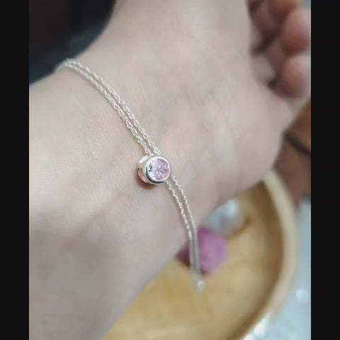 Pulsera punto de luz rosado doble cadena