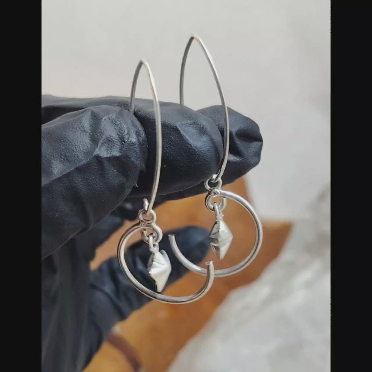 Aros largos con figura estrella